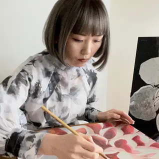 南 靖子