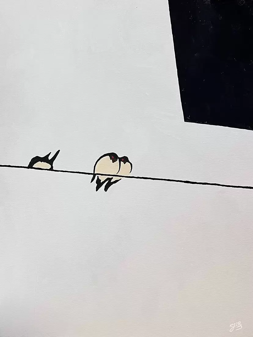 電線にツバメ
