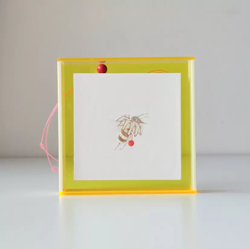 a honeybee wearing a pudding-colored aurora scarf