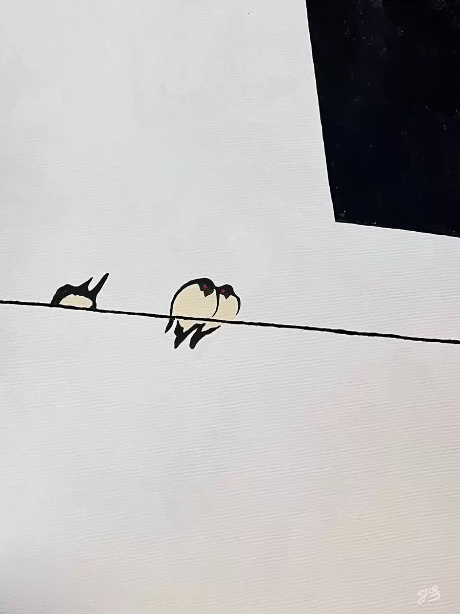 電線にツバメ