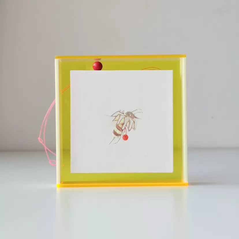 a honeybee wearing a pudding-colored aurora scarf by Ikuko Matsuo