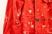 PLUS_curator K's red coverall