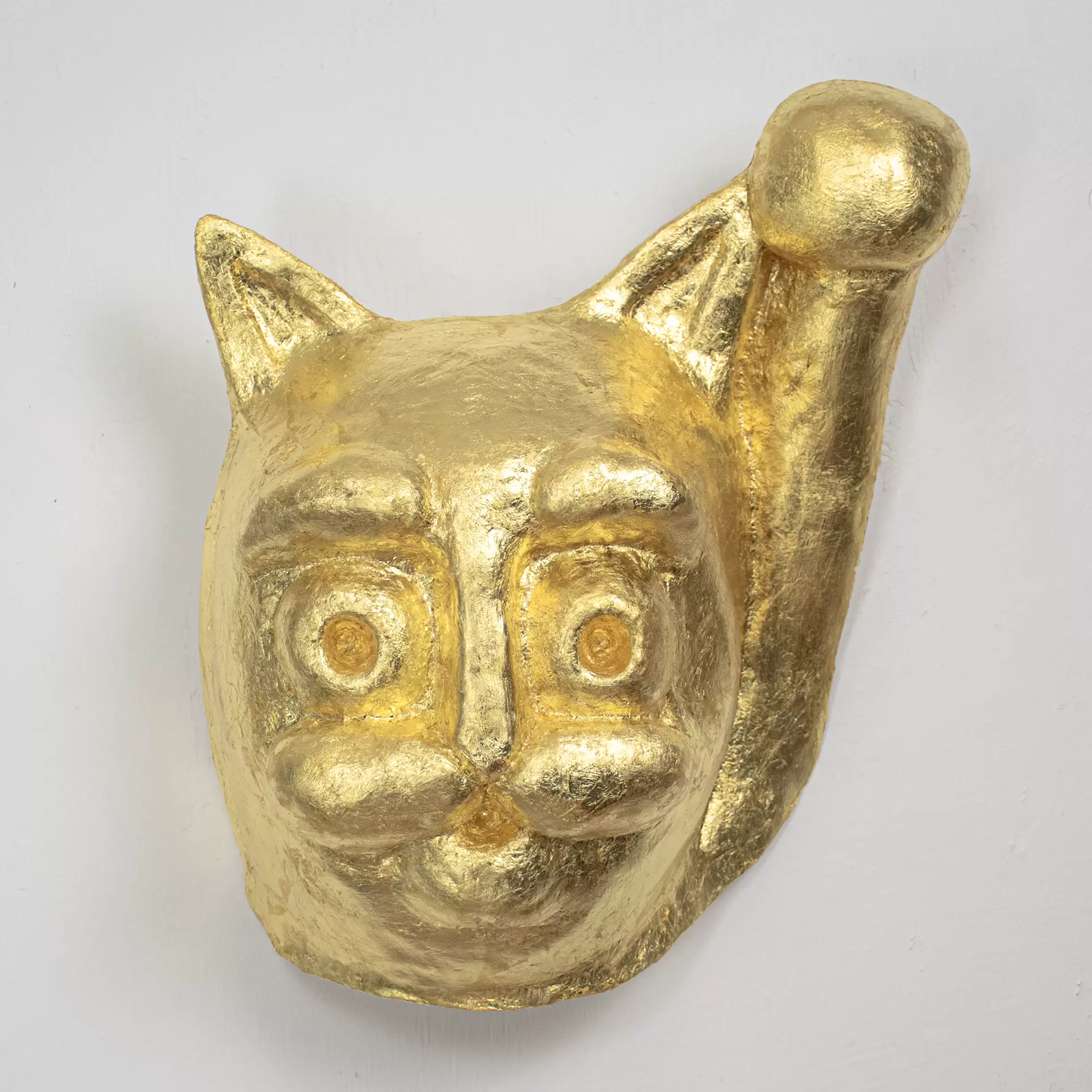 金色招き猫様顔像