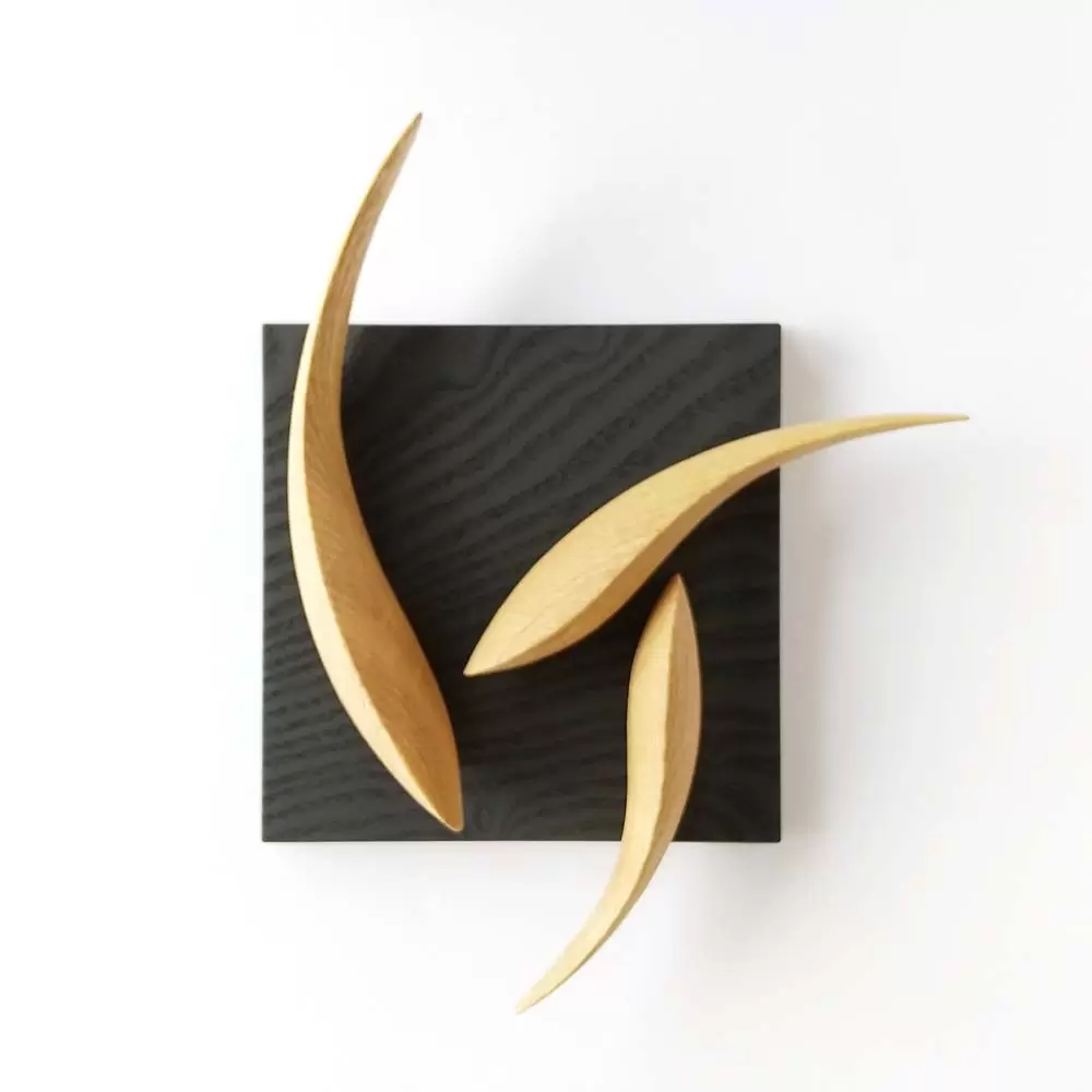 “G” wall hanging object” “looks like an alphabet when you look closely”  